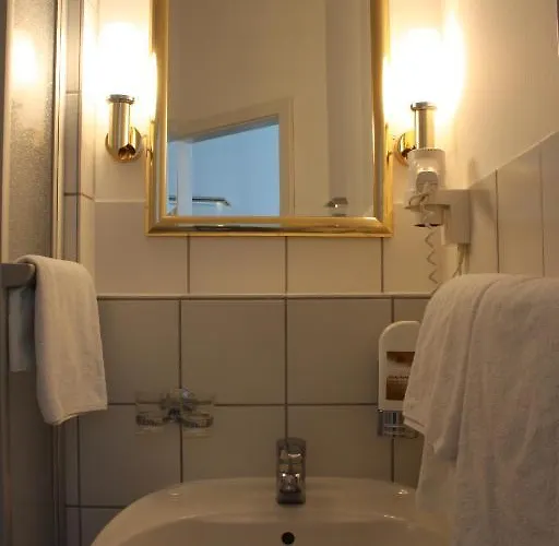 アパートホテル Kraeme Am Roemer - Self Check In 3*